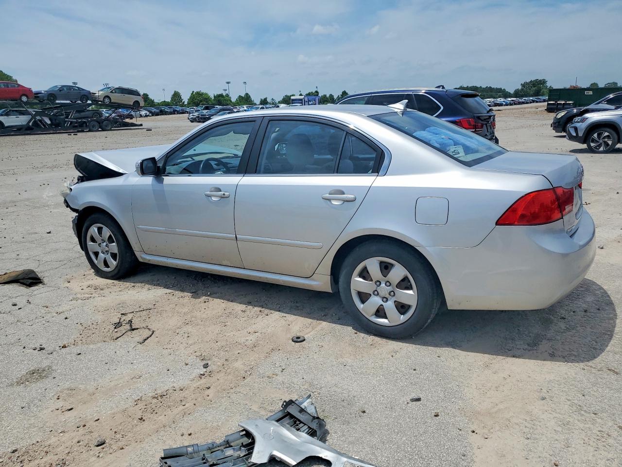 KNAGE228495321454 · 2009 KIA OPTIMA · 2/12