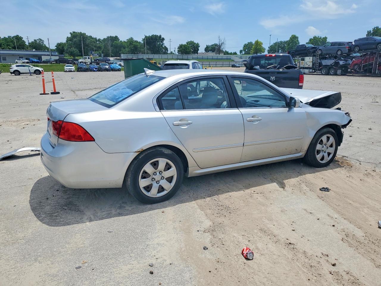 KNAGE228495321454 · 2009 KIA OPTIMA · 3/12