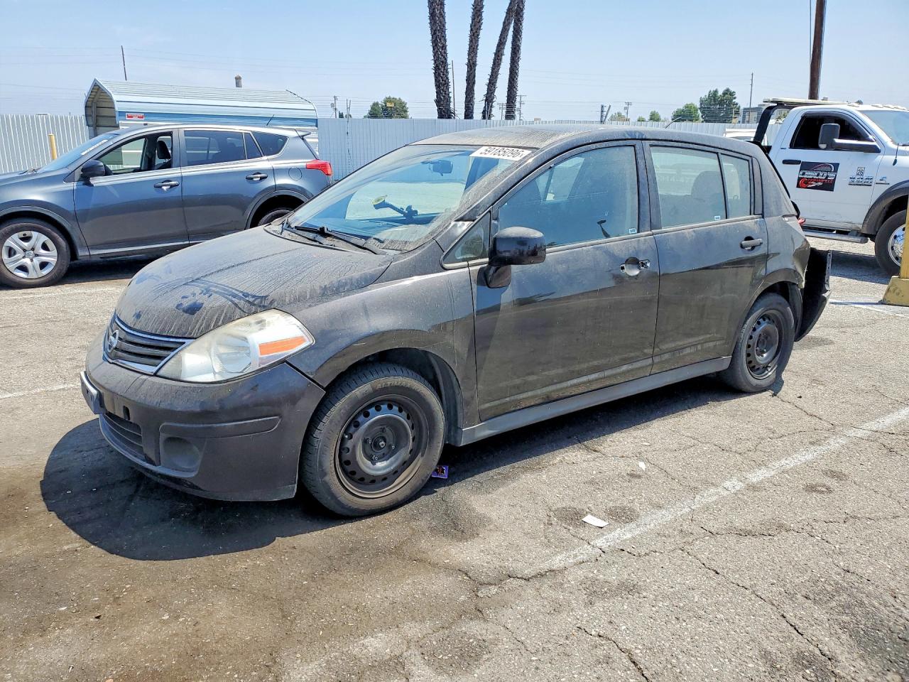 3N1BC1CP2BL411424 · 2011 NISSAN VERSA