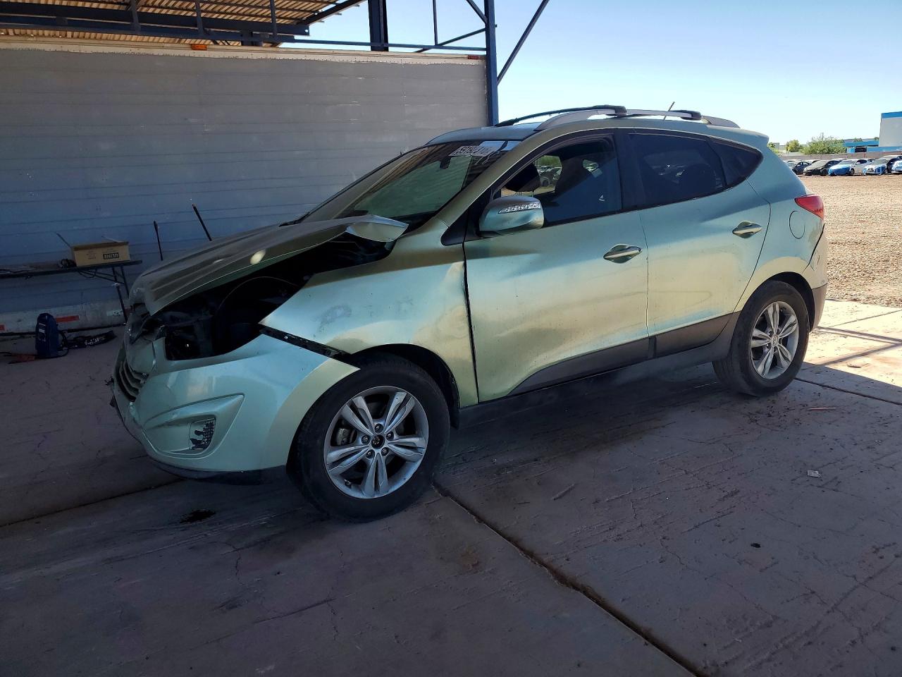 KM8JU3AC7CU437652 · 2012 HYUNDAI TUCSON