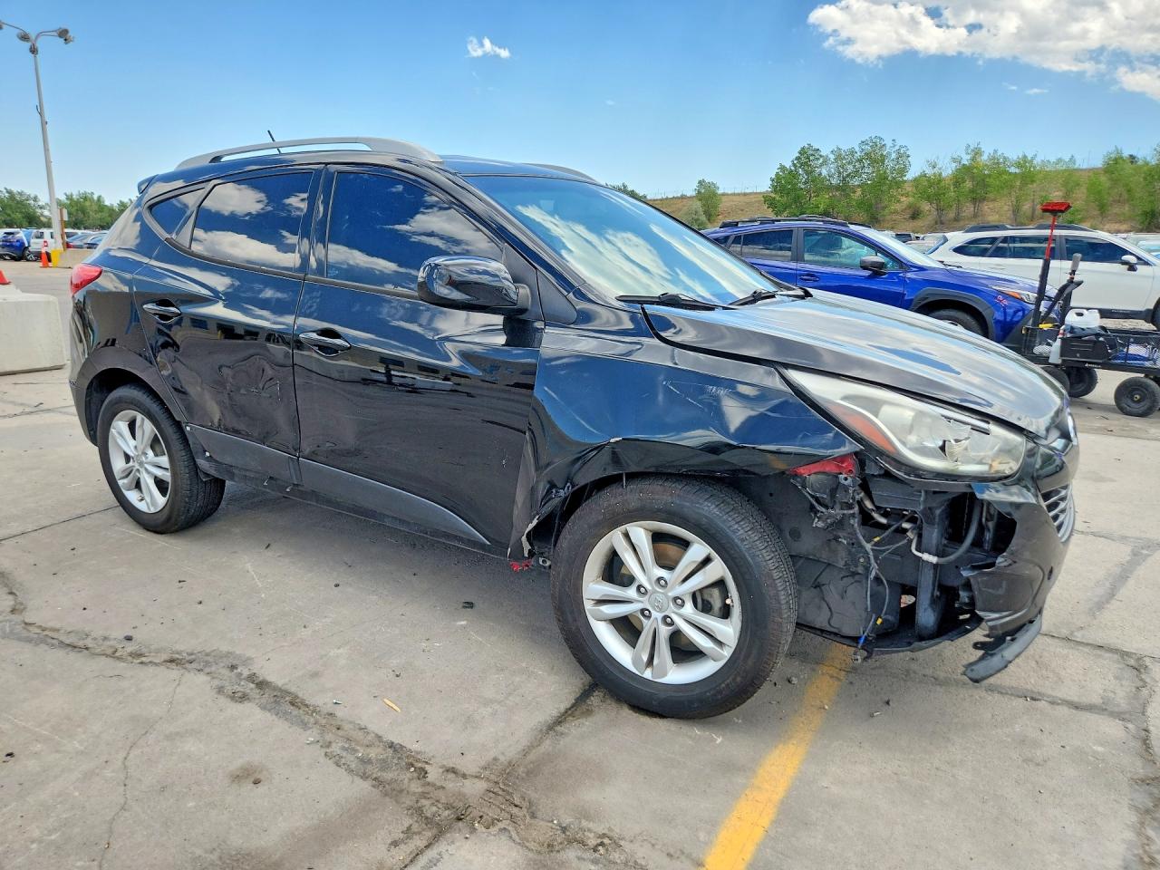 KM8JUCAC0BU257511 · 2011 HYUNDAI TUCSON · 4/14