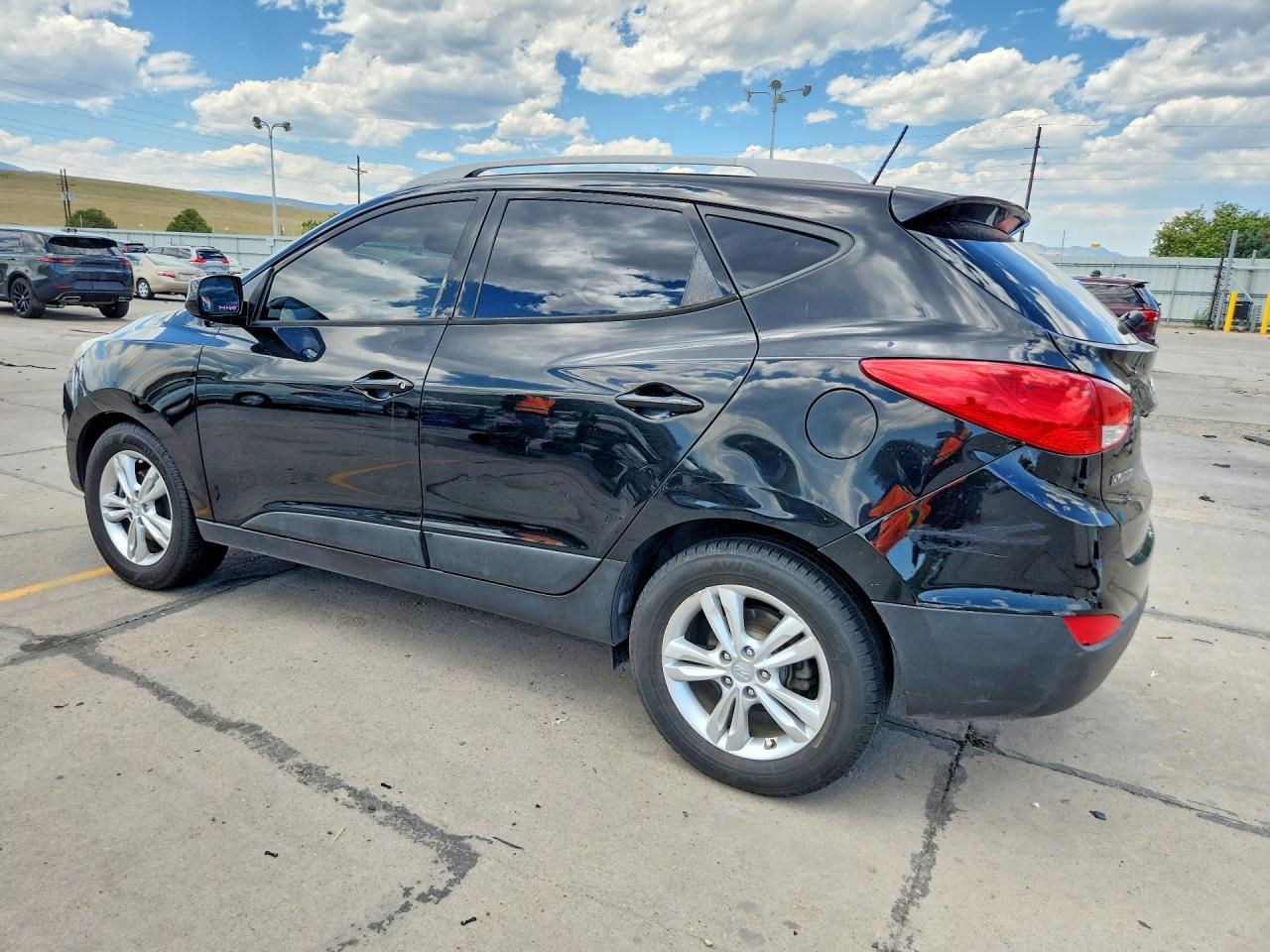 KM8JUCAC0BU257511 · 2011 HYUNDAI TUCSON · 2/14