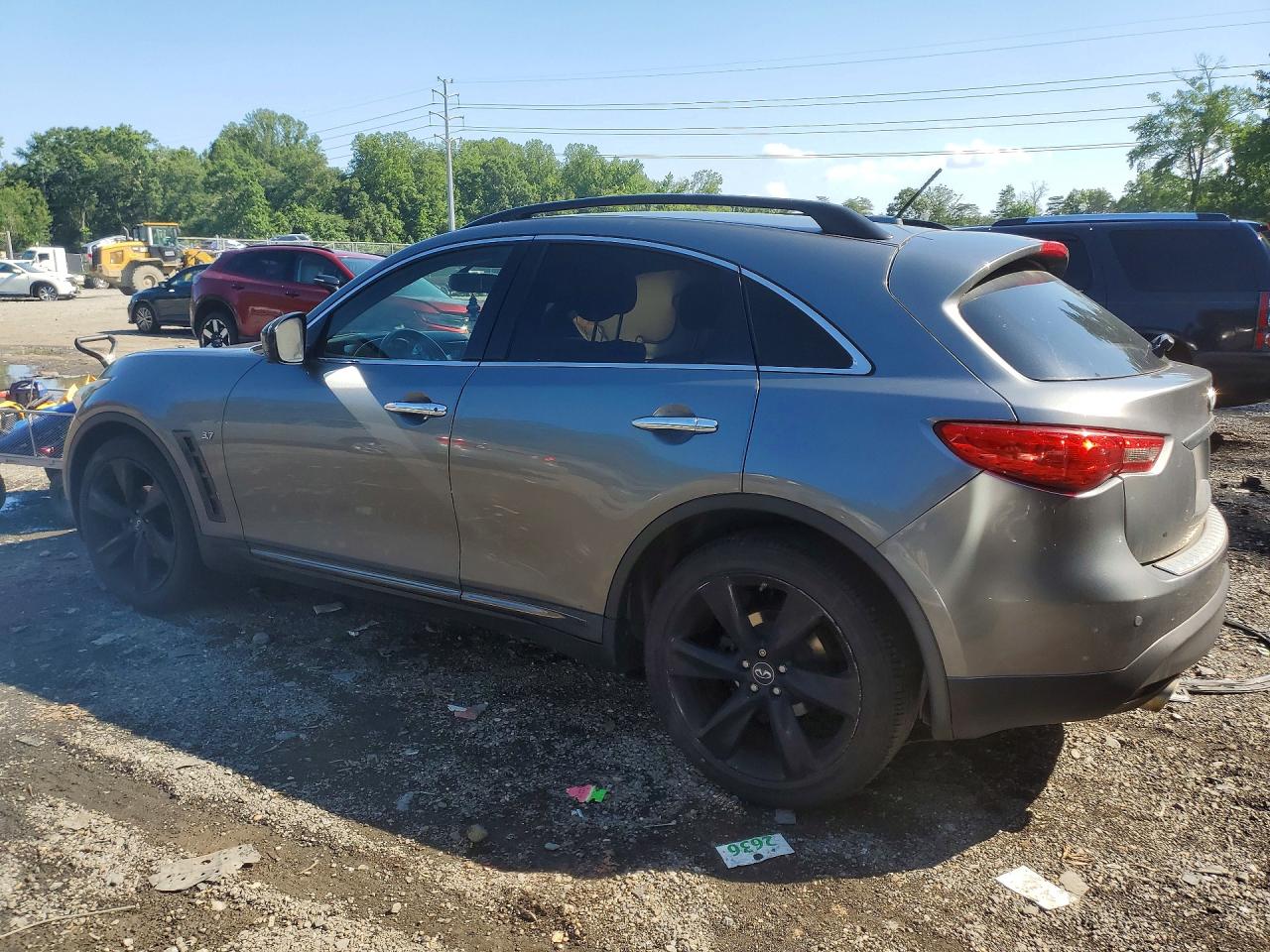 JN8CS1MU9GM671765 · 2016 INFINITI QX70 · 2/13