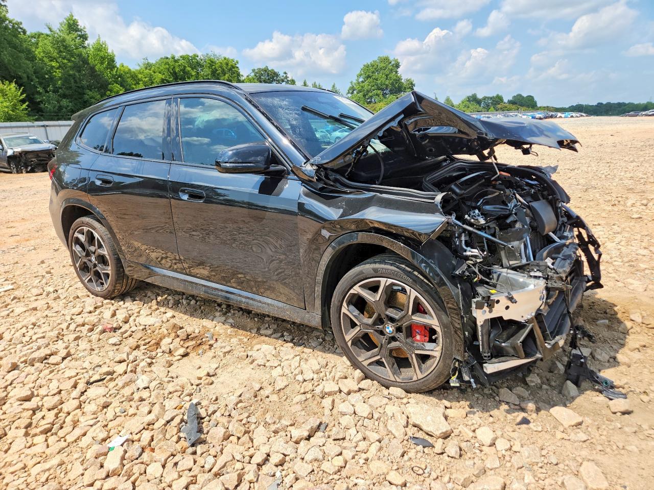 WBX13EF03T5594190 · 2026 BMW X1 · 4/14