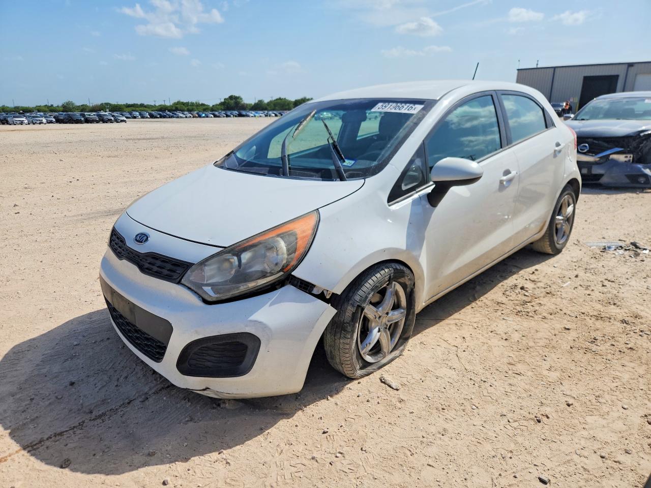 KNADM5A38C6024007 · 2012 KIA RIO