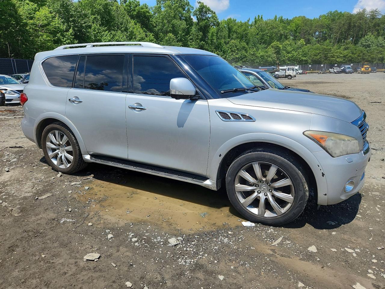 JN8AZ2NC6B9300721 · 2011 INFINITI QX56 · 4/13