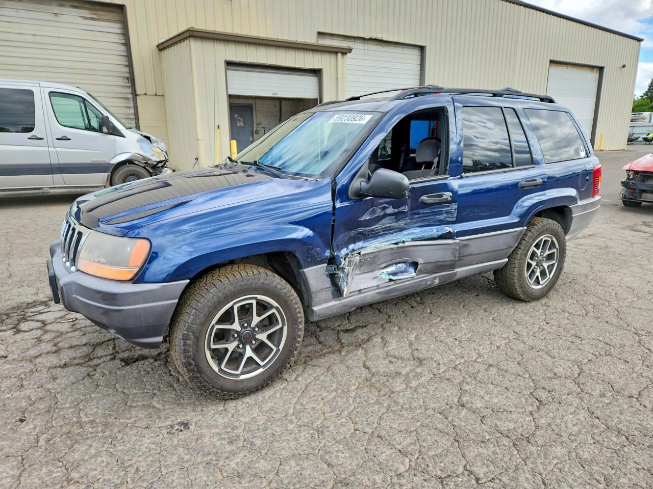 1J4GW48S3YC289633 · 2000 JEEP GRAND CHEROKEE