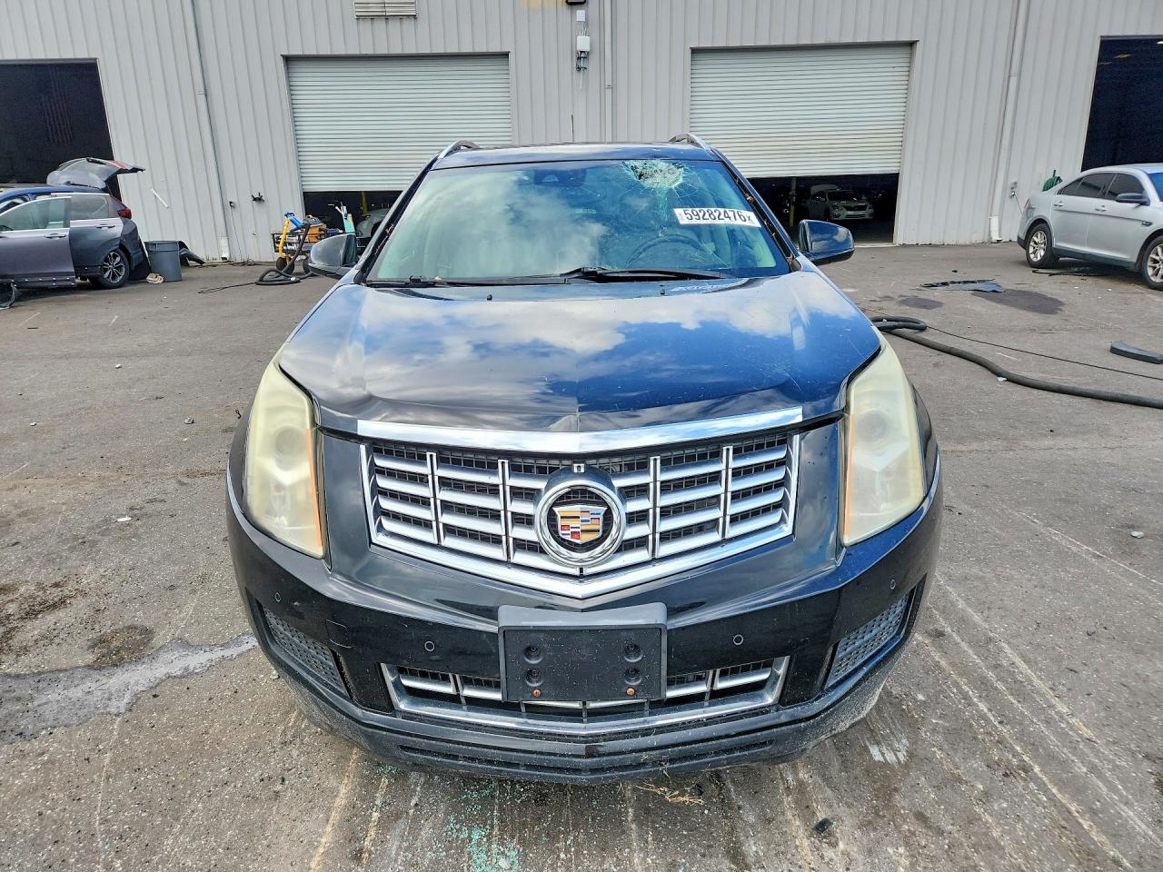 3GYFNBE37GS558452 · 2016 CADILLAC SRX · 5/13