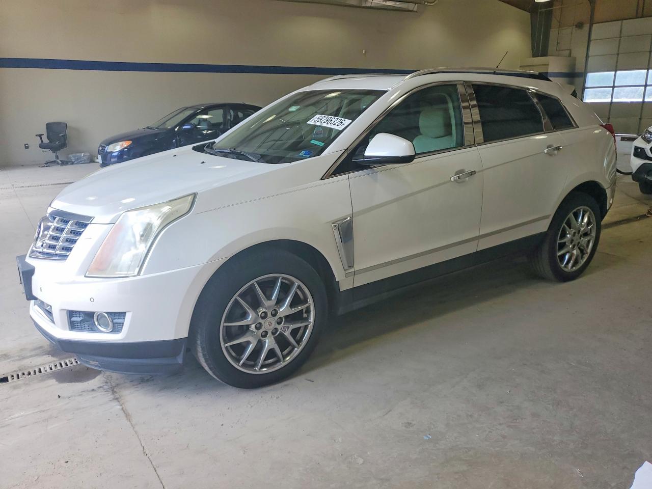 3GYFNDE37ES611708 · 2014 CADILLAC SRX