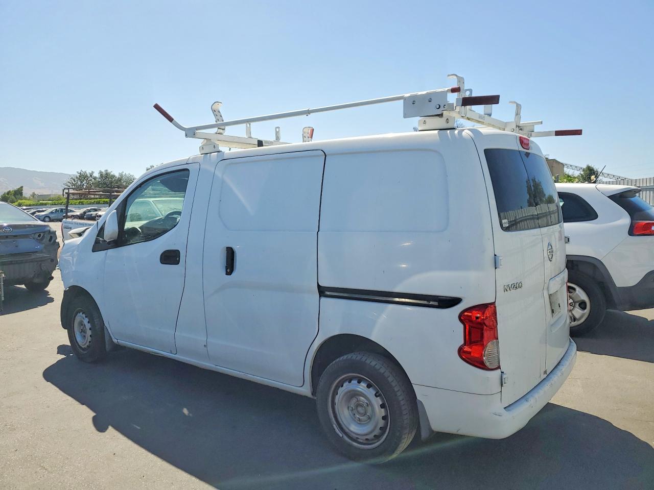 3N6CM0KN7EK702405 · 2014 NISSAN NV200 · 2/12