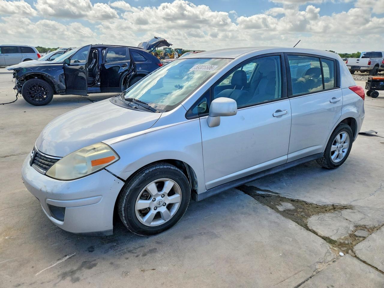 3N1BC13E19L410127 · 2009 NISSAN VERSA