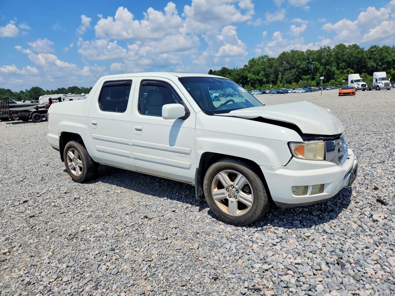5FPYK16509B100935 · 2009 HONDA RIDGELINE · 4/13