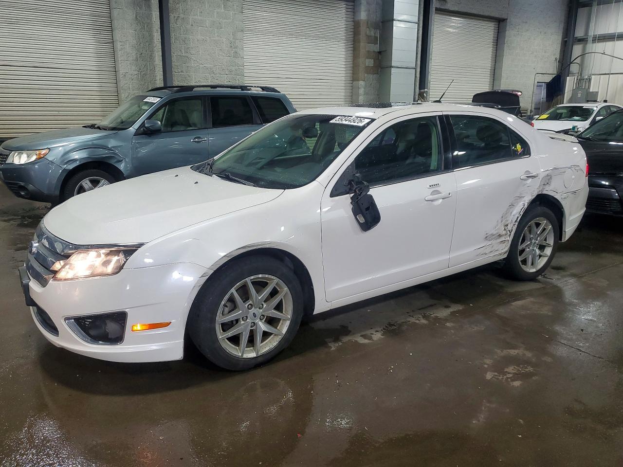 3FAHP0JA7CR225211 · 2012 FORD FUSION