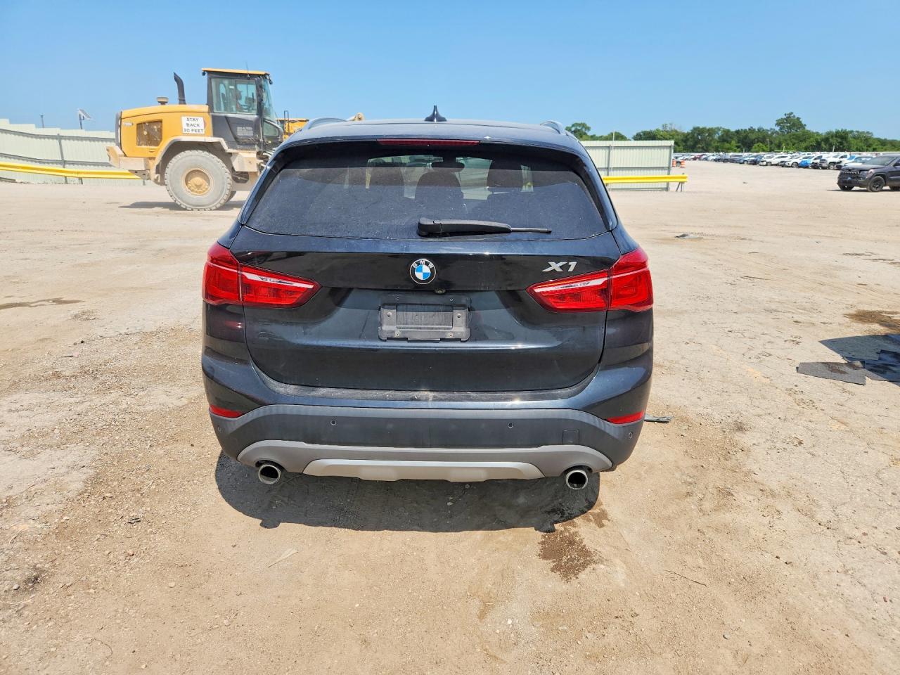 WBXHT3Z35G4A49177 · 2016 BMW X1 · 6/13