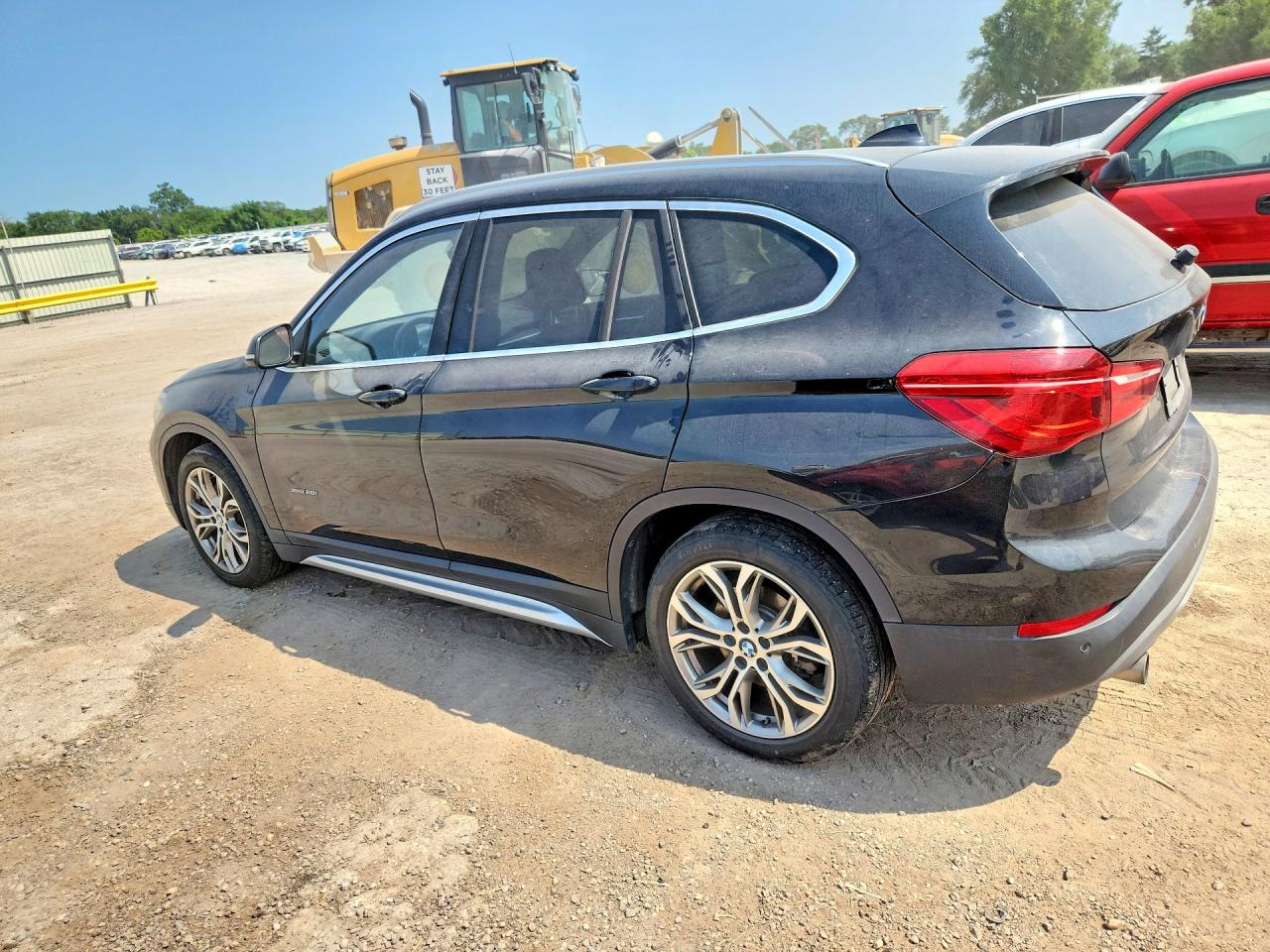 WBXHT3Z35G4A49177 · 2016 BMW X1 · 2/13