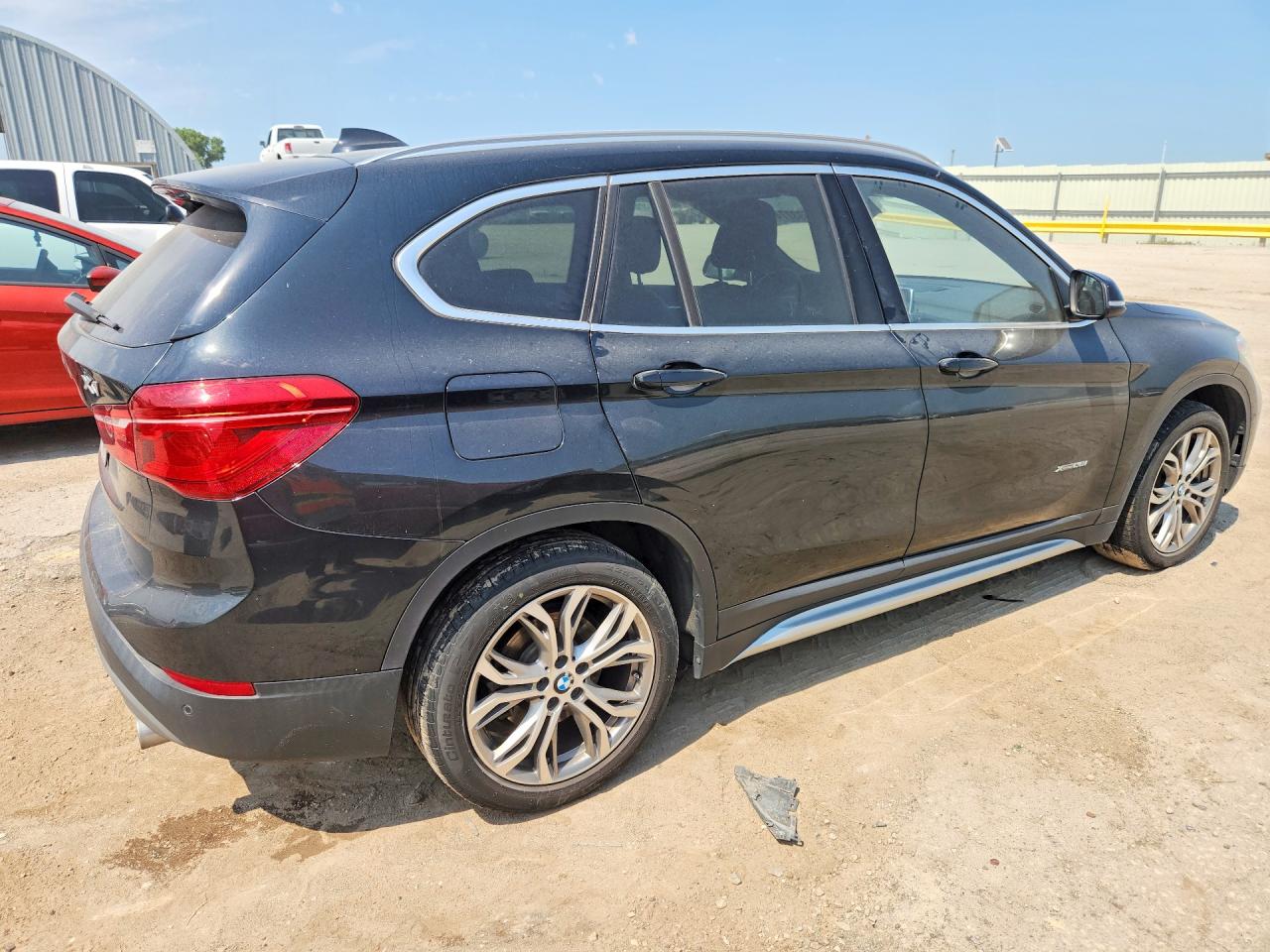 WBXHT3Z35G4A49177 · 2016 BMW X1 · 3/13