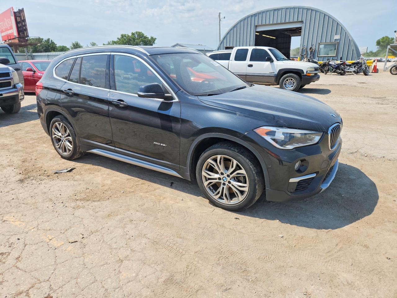 WBXHT3Z35G4A49177 · 2016 BMW X1 · 4/13