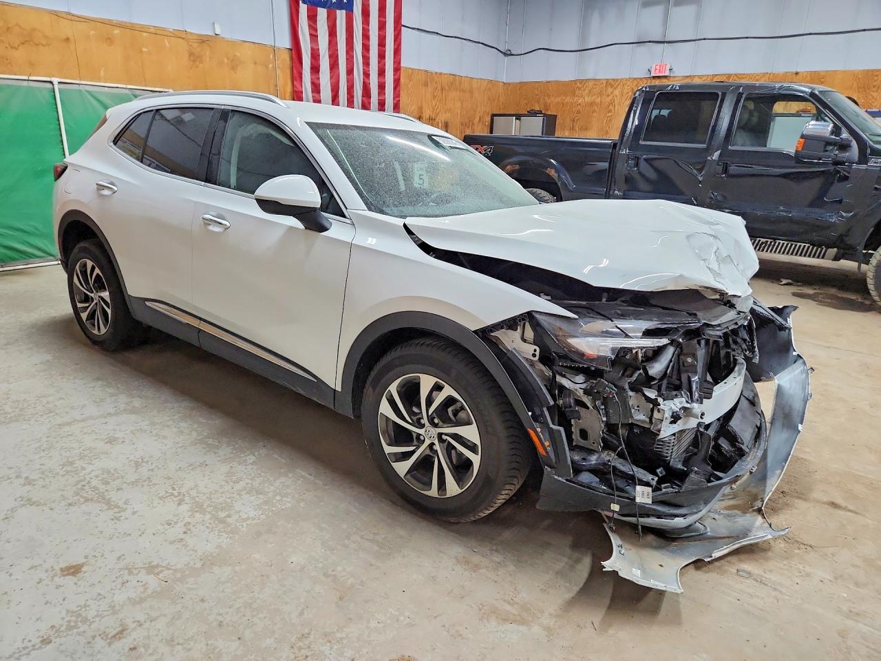 LRBFZNR49PD023877 · 2023 BUICK ENVISION · 4/13