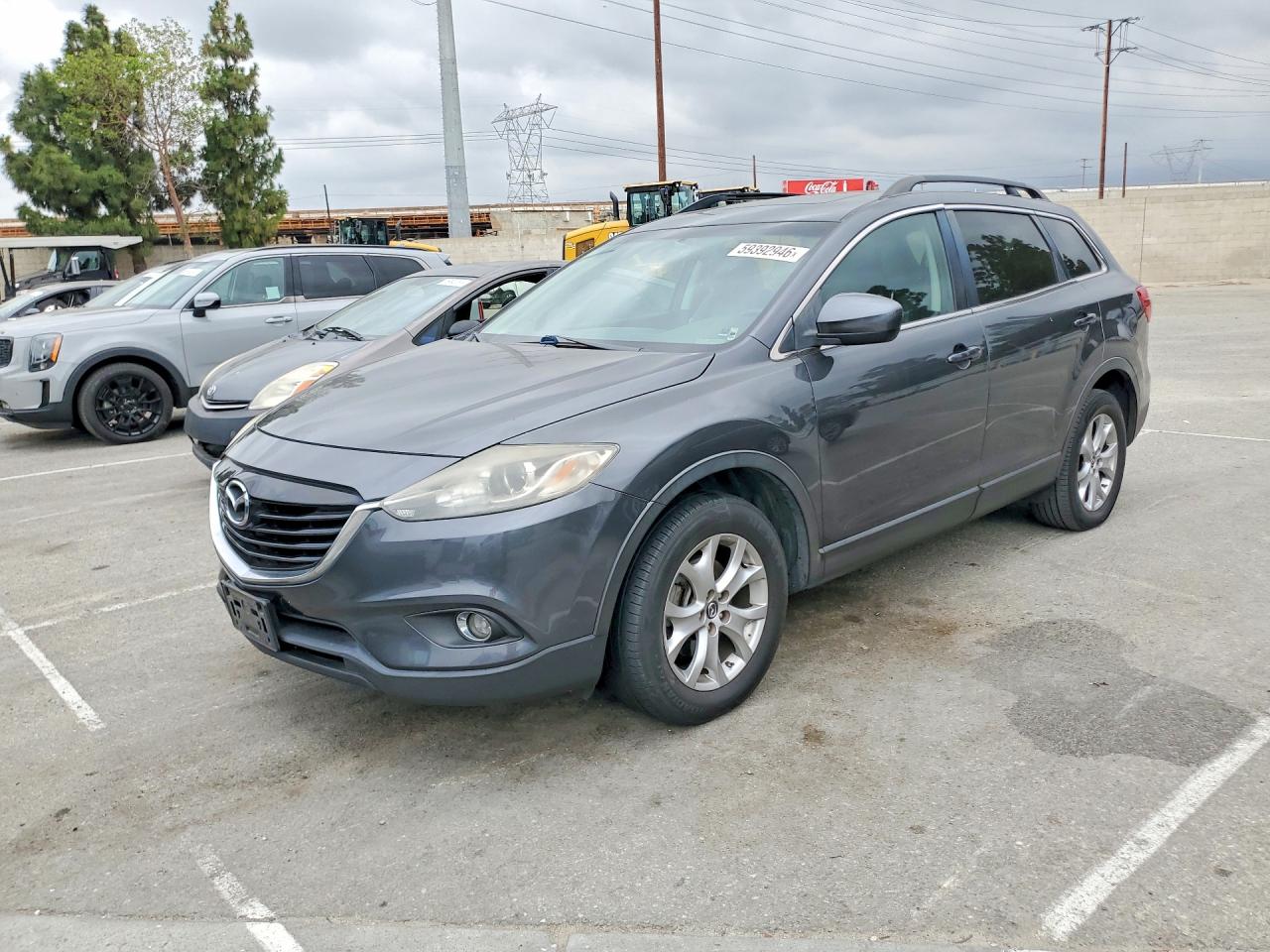 JM3TB2CVXE0431180 · 2014 MAZDA CX-9