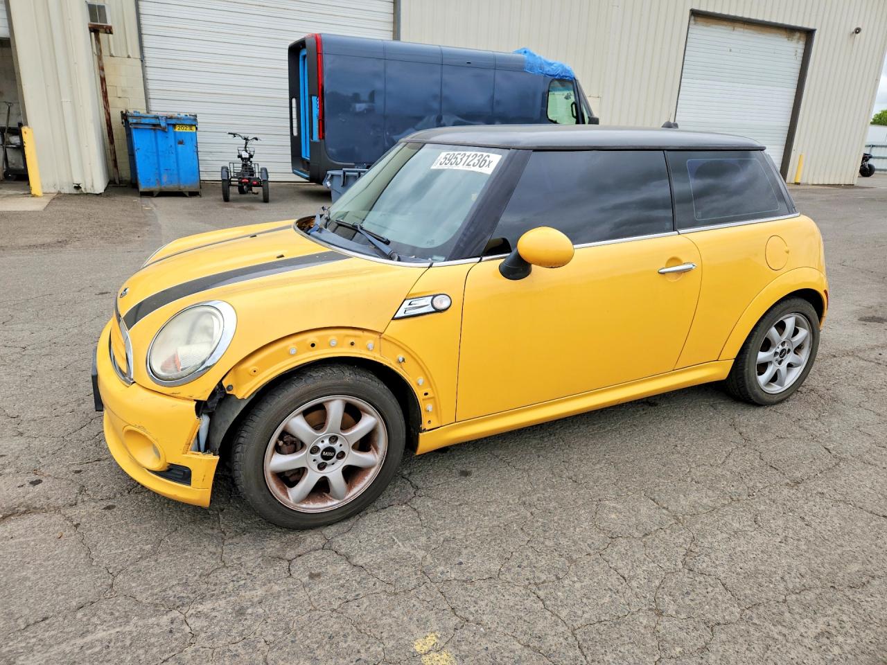 WMWMF33599TU73106 · 2009 MINI COOPER