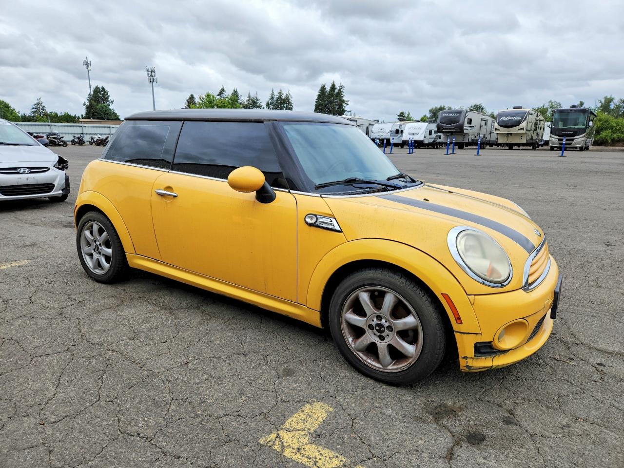 WMWMF33599TU73106 · 2009 MINI COOPER · 4/12
