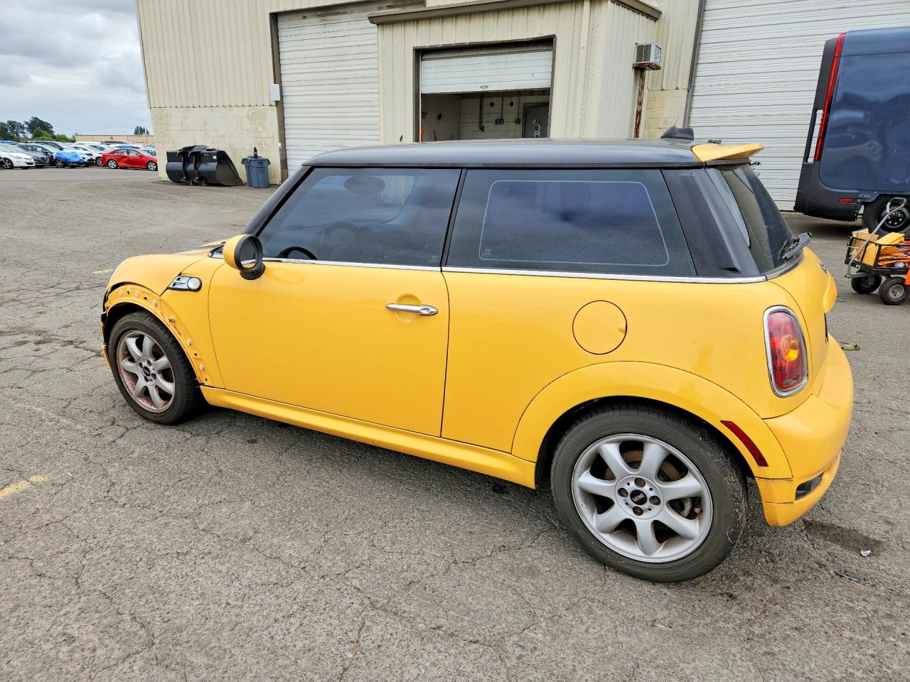 WMWMF33599TU73106 · 2009 MINI COOPER · 2/12