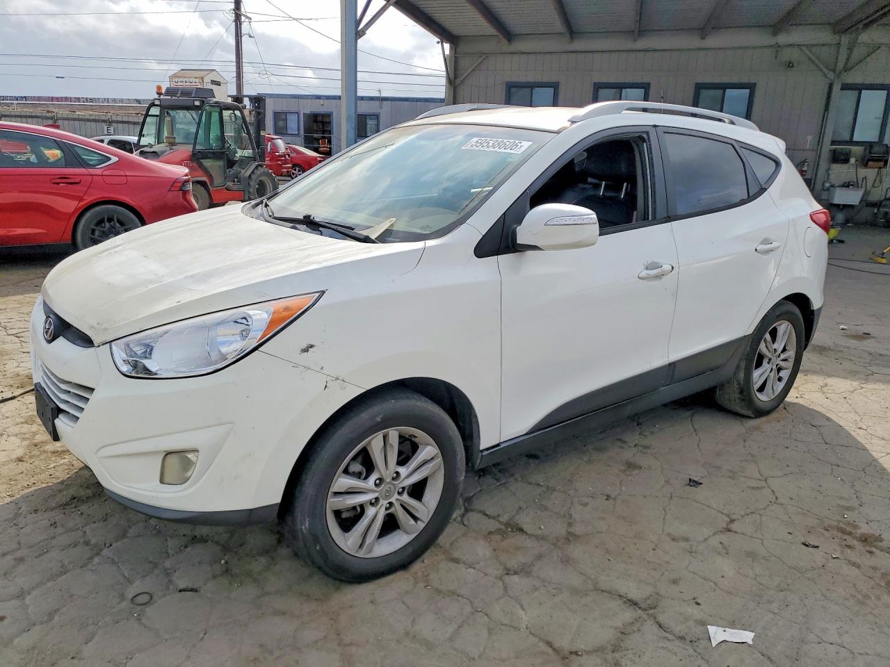KM8JU3AC1DU721232 · 2013 HYUNDAI TUCSON