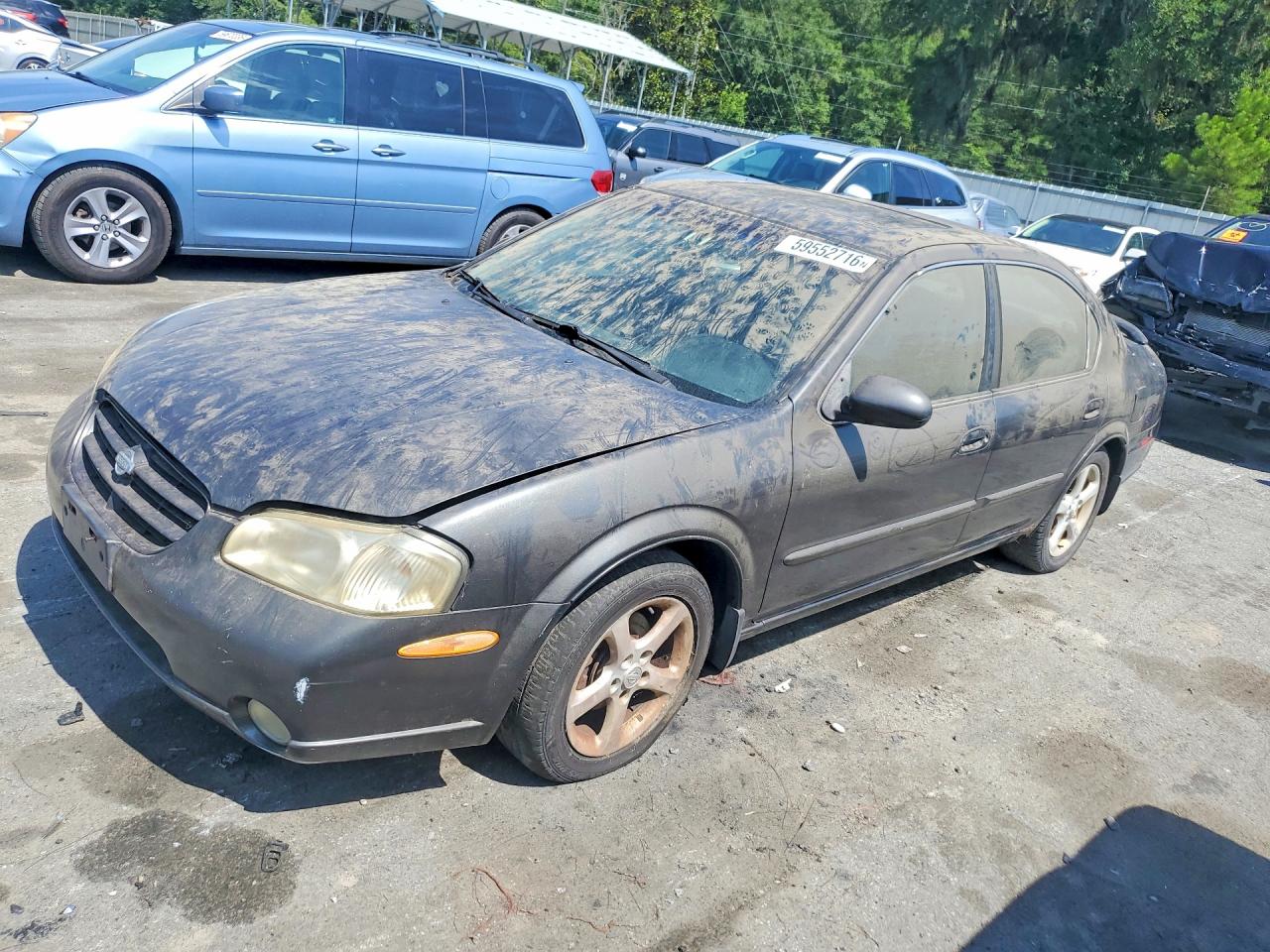 JN1CA31D3YT740569 · 2000 NISSAN MAXIMA