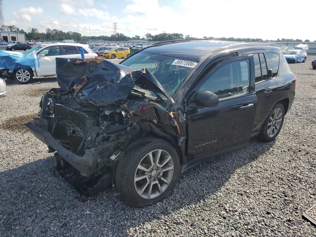1C4NJDBB0GD702203 · 2016 JEEP COMPASS