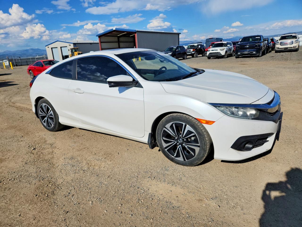 2HGFC3B35JH350233 · 2018 HONDA CIVIC · 4/12