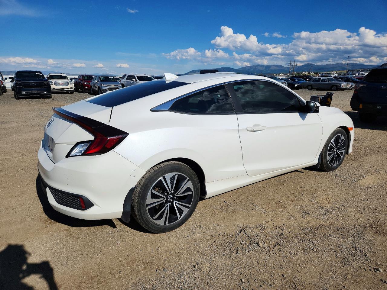 2HGFC3B35JH350233 · 2018 HONDA CIVIC · 3/12