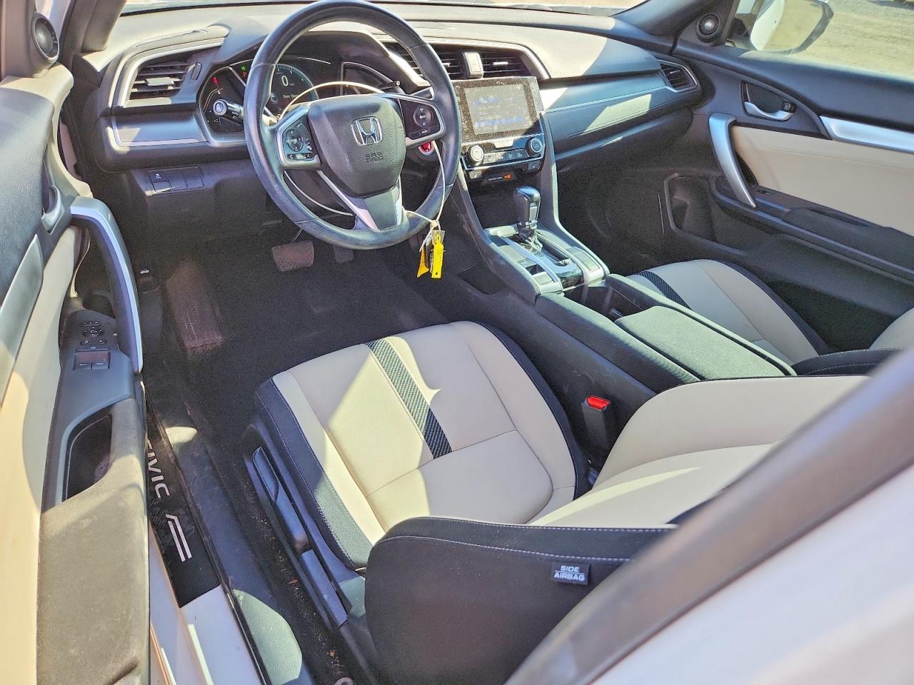 2HGFC3B35JH350233 · 2018 HONDA CIVIC · 8/12