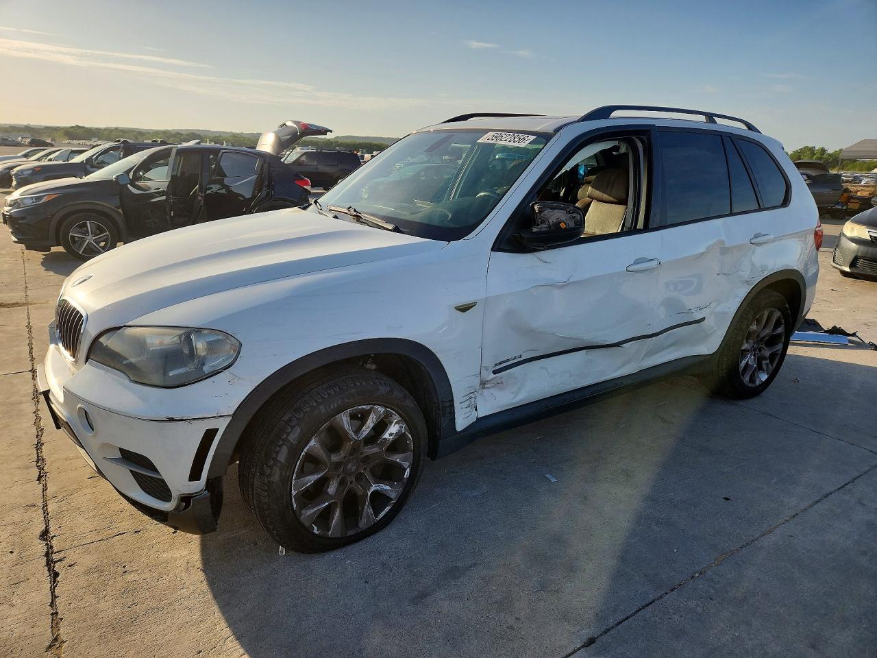 5UXZV4C57CL889713 · 2012 BMW X5