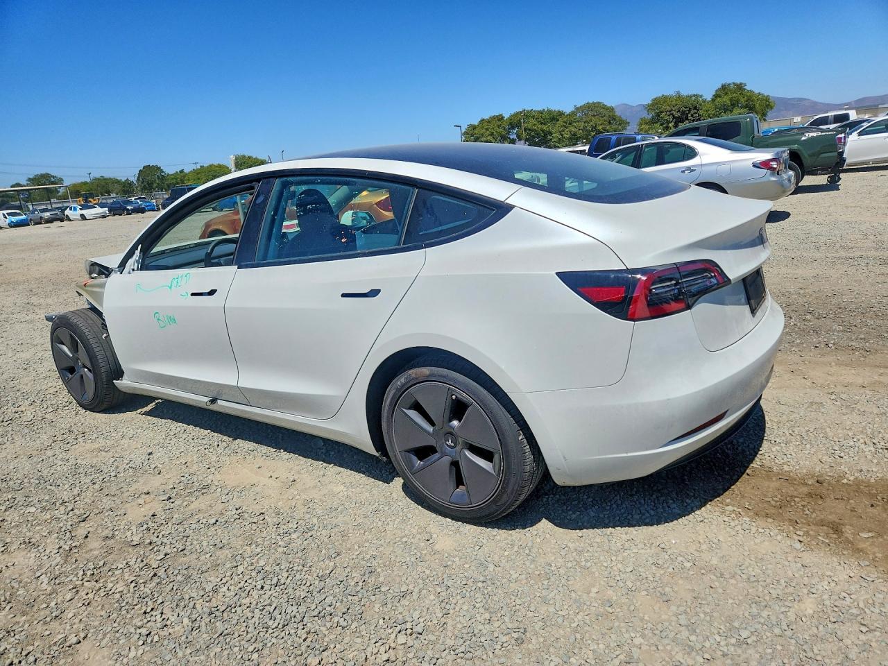 5YJ3E1EA5PF605469 · 2023 TESLA MODEL 3 · 2/12
