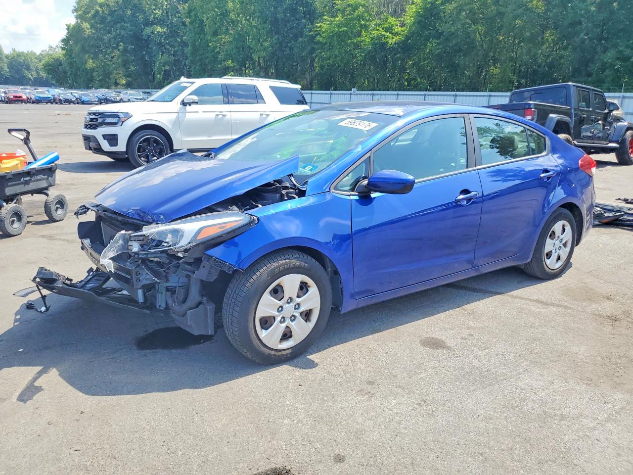 3KPFL4A75JE230758 · 2018 KIA FORTE