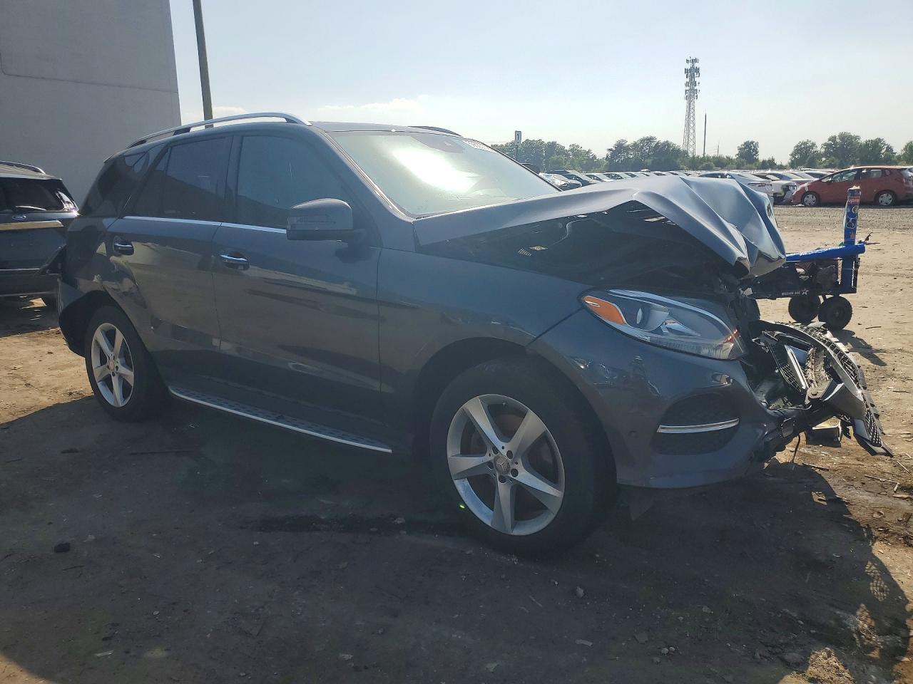 4JGDA5HB6GA754926 · 2016 MERCEDES-BENZ GLE · 4/13