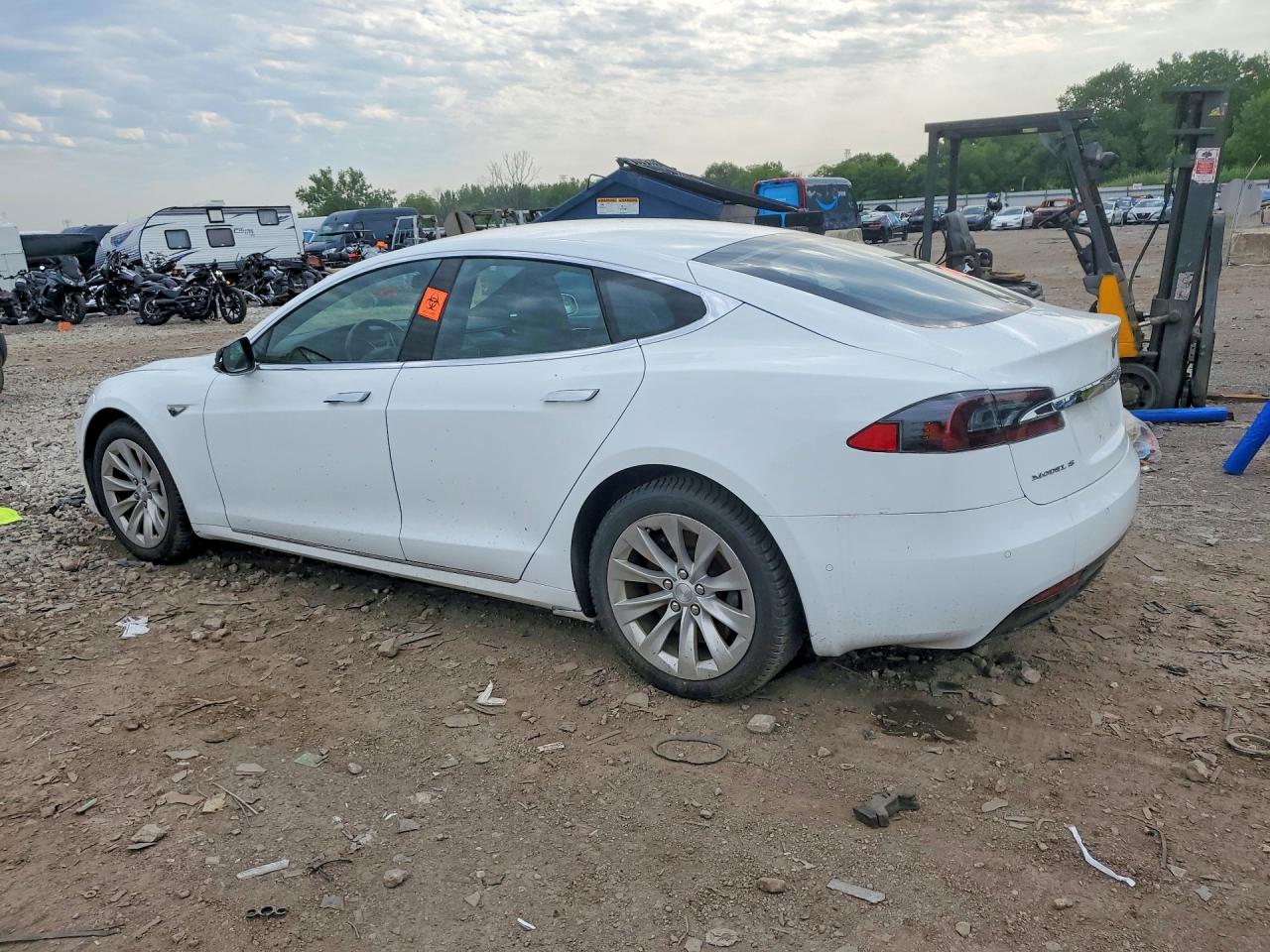 5YJSA1E11GF158470 · 2016 TESLA MODEL S · 2/12