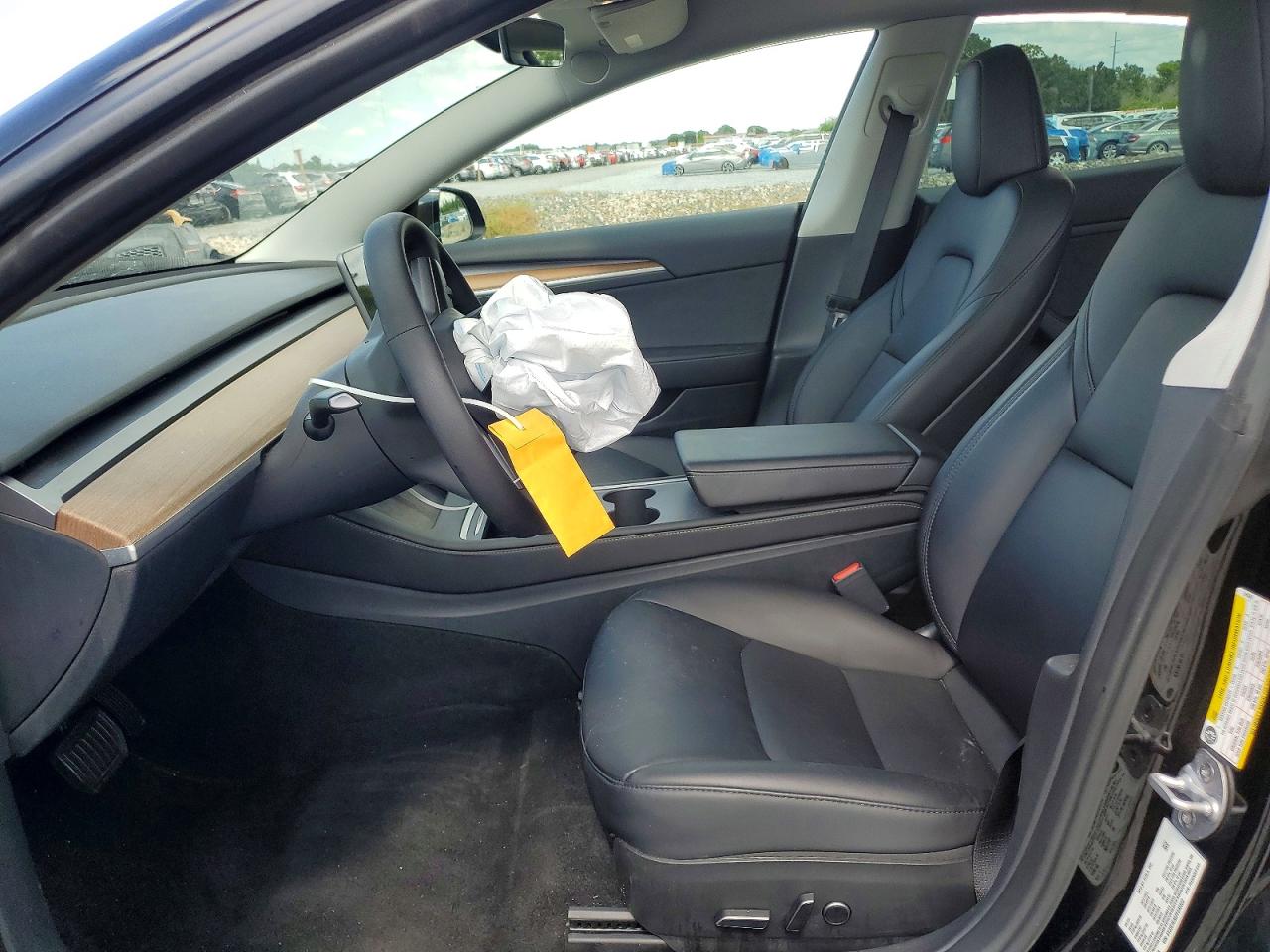5YJ3E1EA5PF645602 · 2023 TESLA MODEL 3 · 7/12