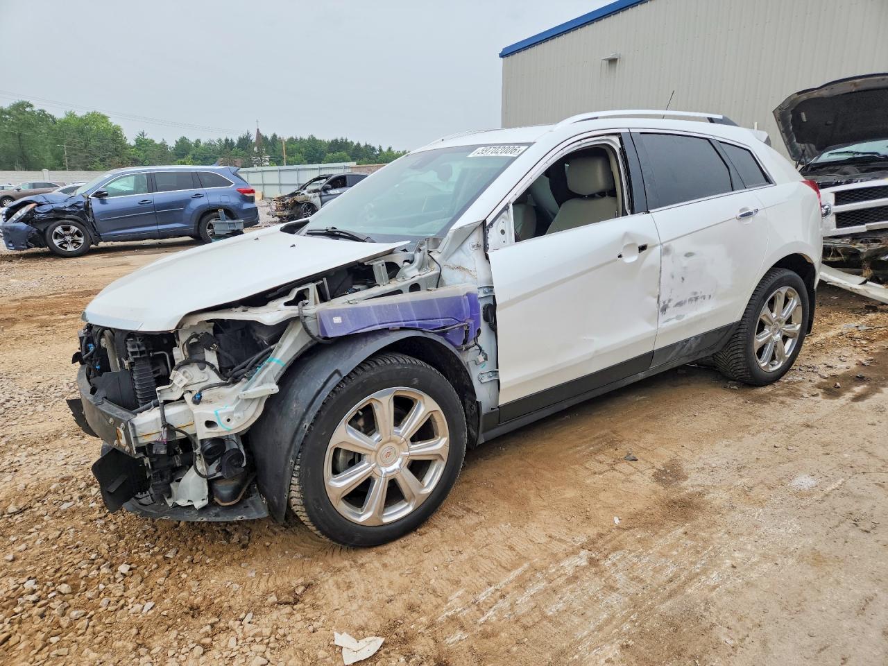 3GYFNGE35FS584883 · 2015 CADILLAC SRX