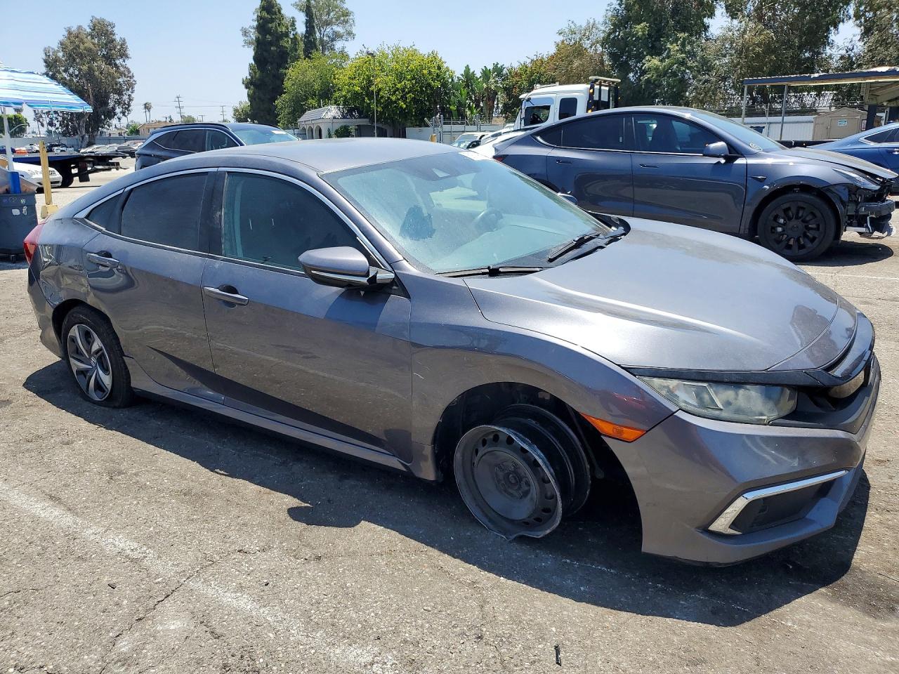 2HGFC2F61KH579024 · 2019 HONDA CIVIC · 4/12