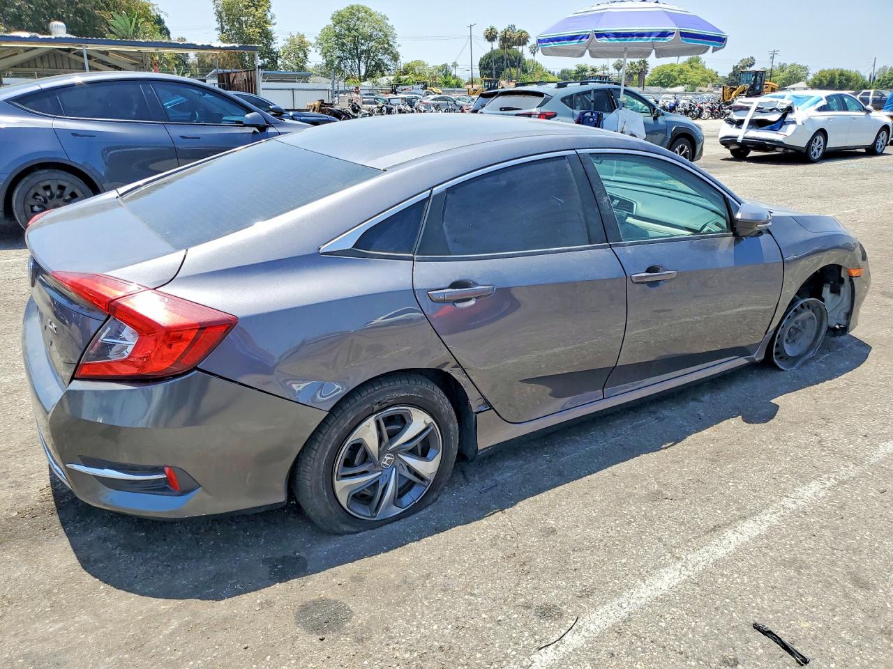 2HGFC2F61KH579024 · 2019 HONDA CIVIC · 3/12
