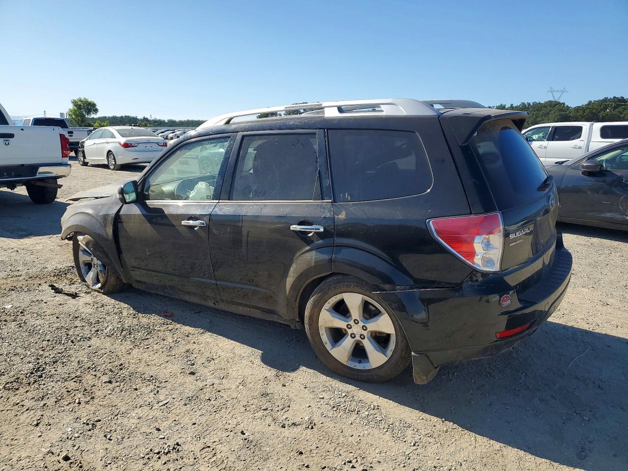 JF2SHGGC8BH739472 · 2011 SUBARU FORESTER · 2/12