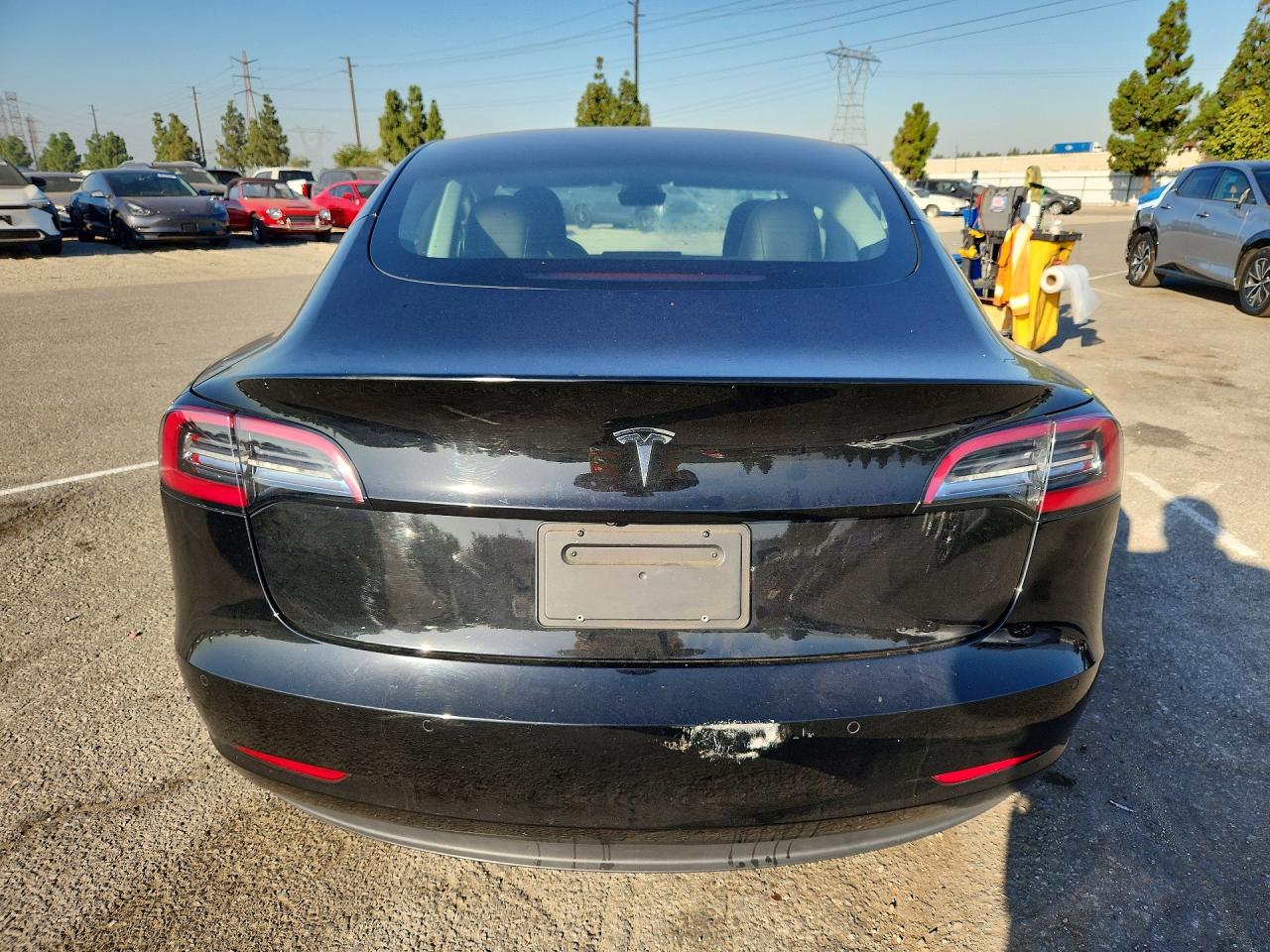 5YJ3E1EA0MF876449 · 2021 TESLA MODEL 3 · 6/13