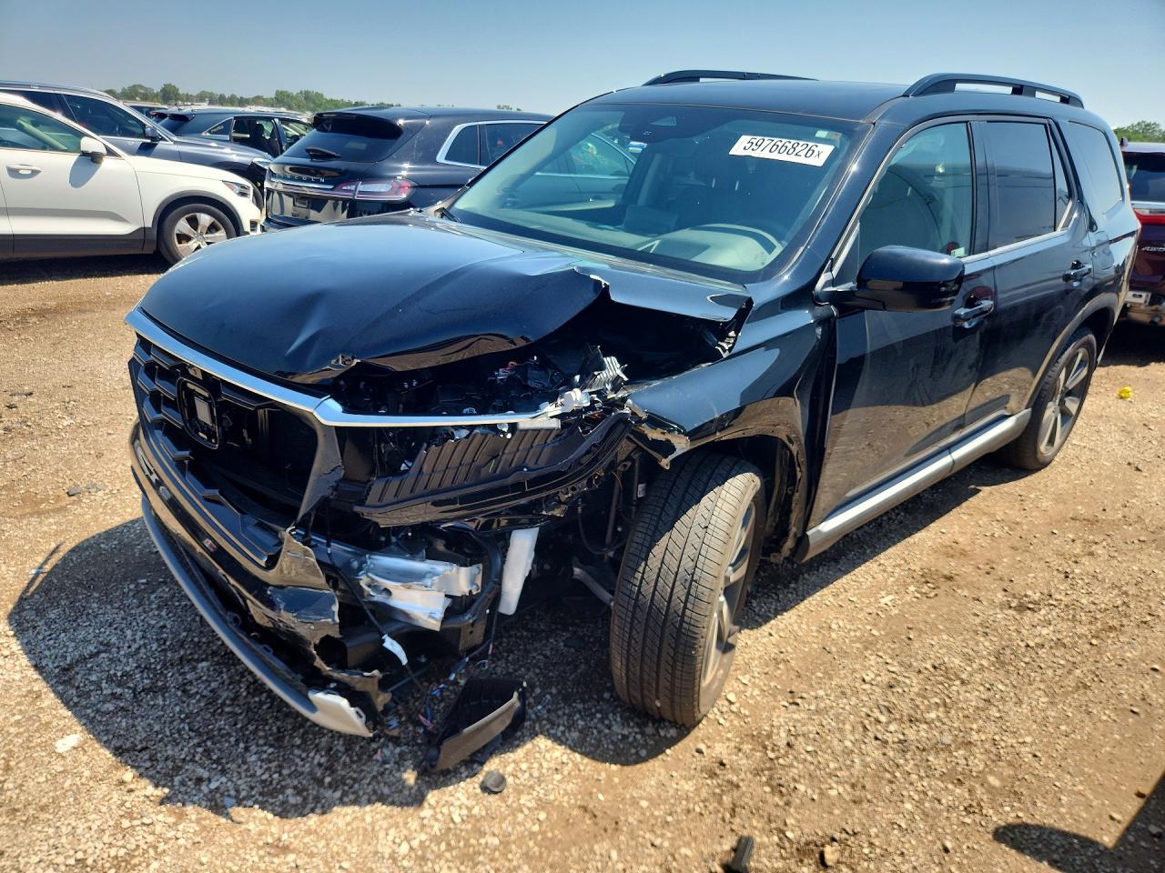 5FNYG1H88SB129607 · 2025 HONDA PILOT