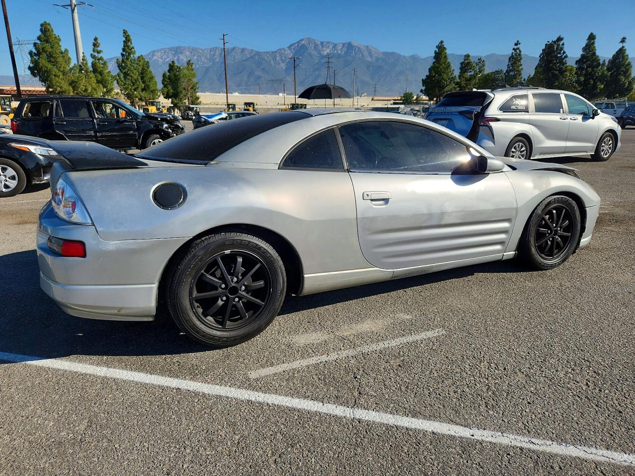 4A3AC44G6YE043781 · 2000 MITSUBISHI ECLIPSE · 3/11