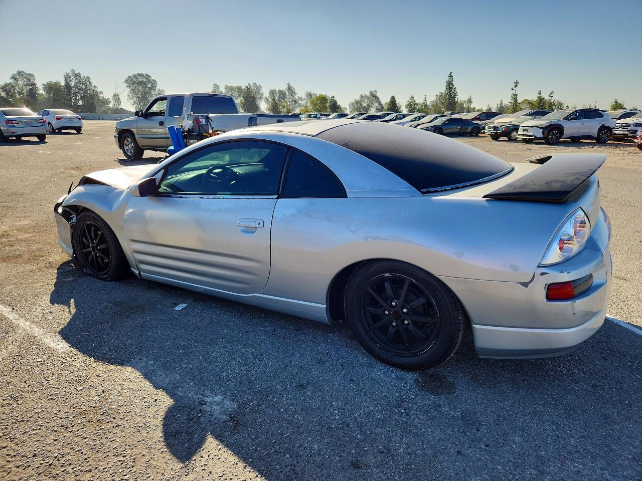 4A3AC44G6YE043781 · 2000 MITSUBISHI ECLIPSE · 2/11