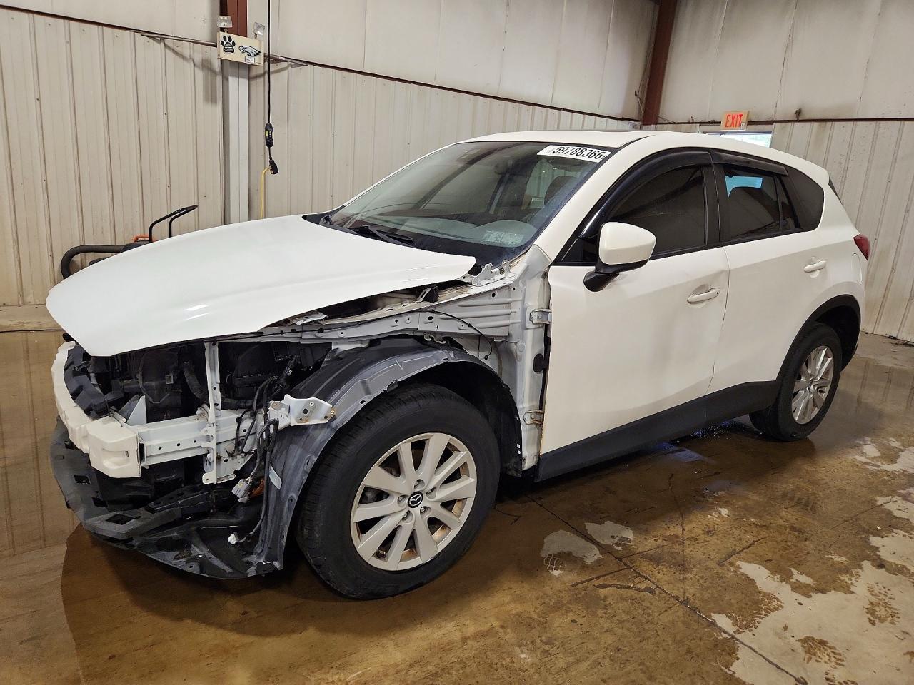 JM3KE4CY0E0381818 · 2014 MAZDA CX-5