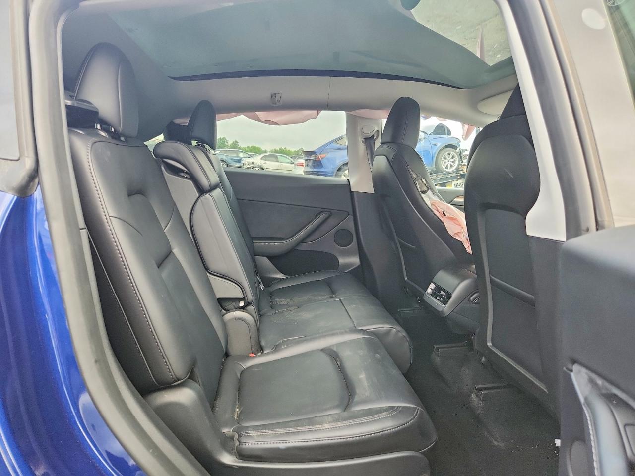 7SAYGAEE4PF879140 · 2023 TESLA MODEL Y · 11/13