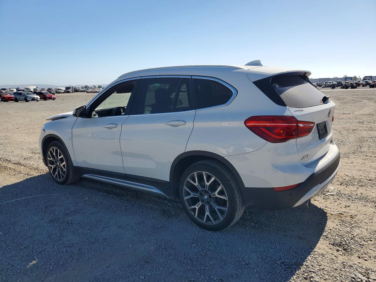 WBXJG7C00M5S27916 · 2021 BMW X1 · 2/13