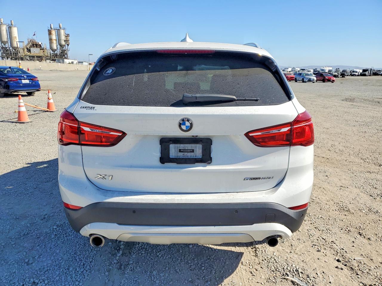 WBXJG7C00M5S27916 · 2021 BMW X1 · 6/13